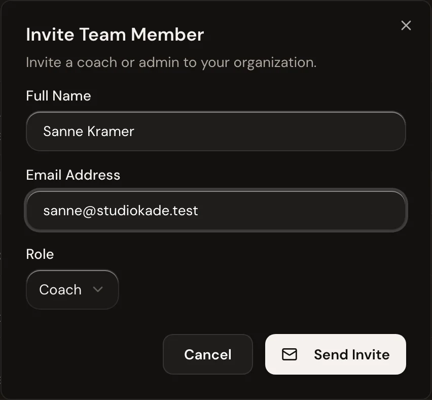 Inviting a team member in Trainnode: Sanne Kramer, sanne@studiokade.test, with the role Coach.